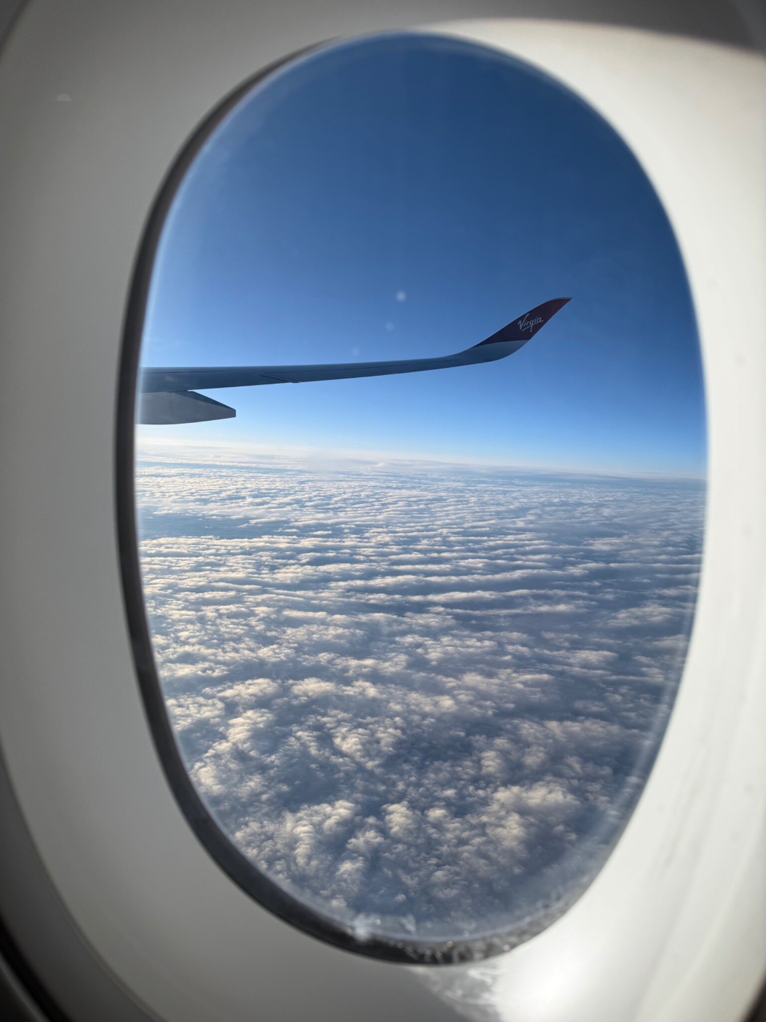 View from a Virgin Atlantic flight above the clouds